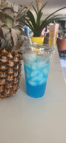 Customer holding a Tavo drink as part of their daily wellness routine.